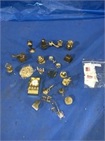 Miniature brass ornaments and some 1980 Canadian