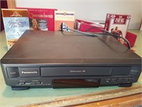 VHS player and several religious VHS tapes