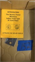 8K gold, miniature Indian head type $5 dollar