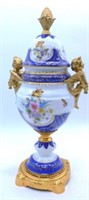 Blue and White Gilt Accented Porcelain Lidded Urn.