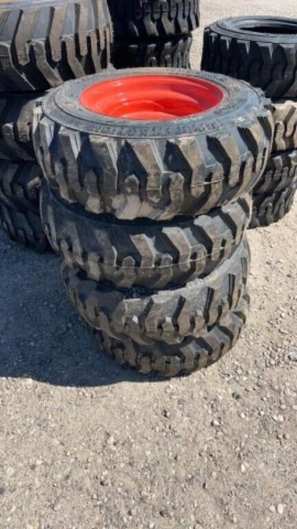 4- New 10-16.5NHS Skid Steer Tires on Rim
