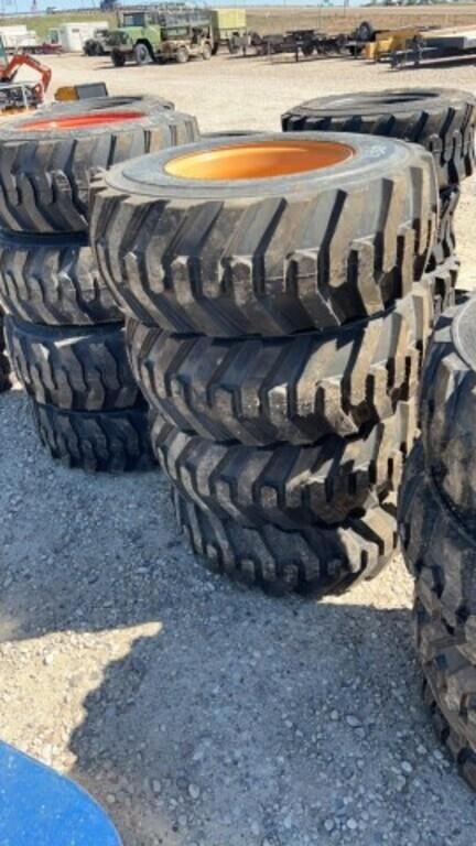 4- New 12-16.5NHS Skid Steer Tires on Rim