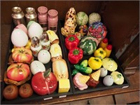 Two trays of salt and pepper shakers including