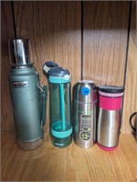 3 Thermal insulated cups and plastic water bottle