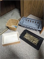 Assortment of organizing trays and wicker basket