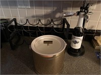 Wine rack, ice bucket and wine bottle opener.