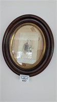 Vintage oval framed portrait