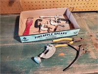 Box of clamps, pipe cutter, pliers