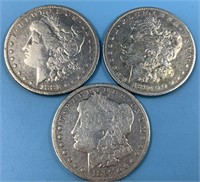 3 Morgan silver dollars: 1880 O, 1881 O, 1887 O
