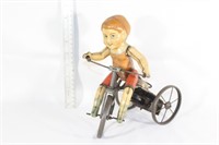 Vintage Louis Marx tin toy-boy riding bike