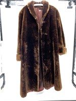 Beautiful faux fur lady's jacket, some seam separa
