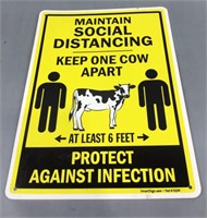 Plastic social distancing one cow apart sign