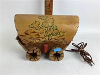 Wooden Covered Wagon Lamp with fiberglass shade.