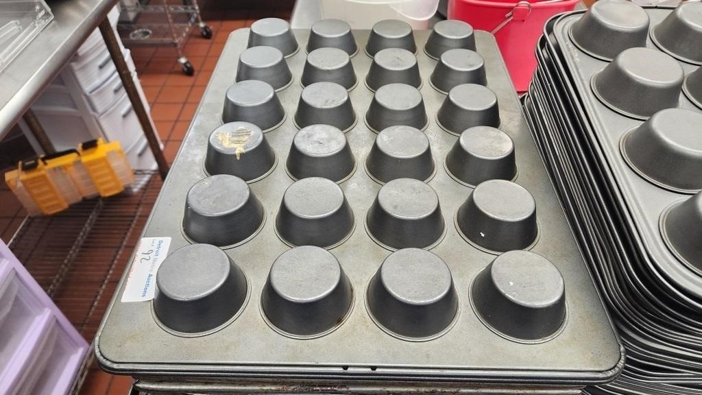 Stack of 24 cup baking Trays