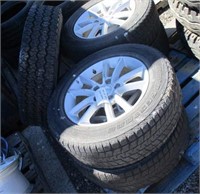 (4) 225/65R17 Tires on Alloy Rims & (1) Truck Tire