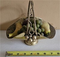 Basket with fake fruit