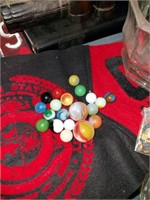 Collection of marbles and kids dragnet badge