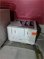 Rival four slot toaster