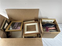 Two boxes of misc picture frames