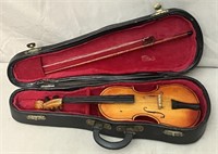 Miniature novelty wooden violin.
