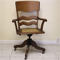 Cane Bottom Rolling Chair