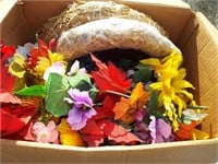 Large box of assorted colorful faux flowers for
