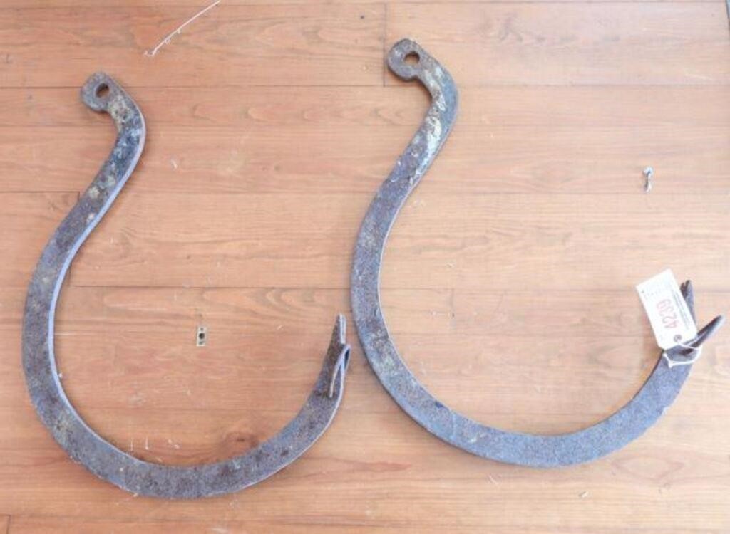 Pair of Cast iron hay hook/prybars with loop