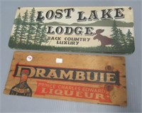(2) Wood signs, cabin and booze crate end.