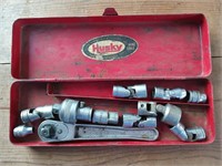 Snap-on ratchet, socket, wiggles in metal box