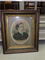 antique portrait in wooden frame
