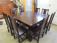 Large dining room wooden table with 8 chairs