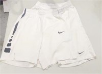 2 Pairs Med Nike Dri-Fit Shorts. Small stain on