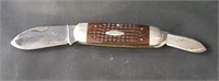 Case, engraved, wood-grip folding knife