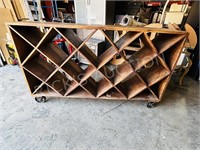 industrial style wine rack on metal wheels
