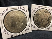 Lot of 2 Morgan silver dollars with protectors