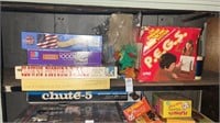 Shelf lot of games, puzzles, and toys