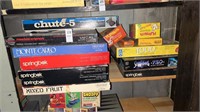 Shelf lot of games and puzzles