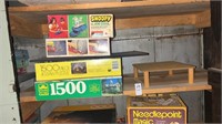 Shelf lot of games and puzzles