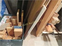 assorted wood in box and on shelf