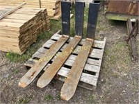 Three 48" X6" pallet forks off of fork lift