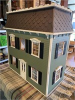 Handcrafted dollhouse with contents