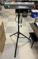 Outdoor infrared space heater on tripod stand