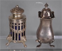 Two sterling silver salt shakers
