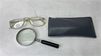 Glasses and magnifying glass