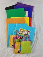 Folders and small gift bags