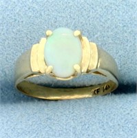 Opal Solitaire Ring in 14k Yellow Gold