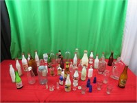Old Pop Bottles, Milk Bottles, And Various Bottles