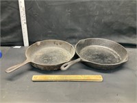 2 cast iron pans