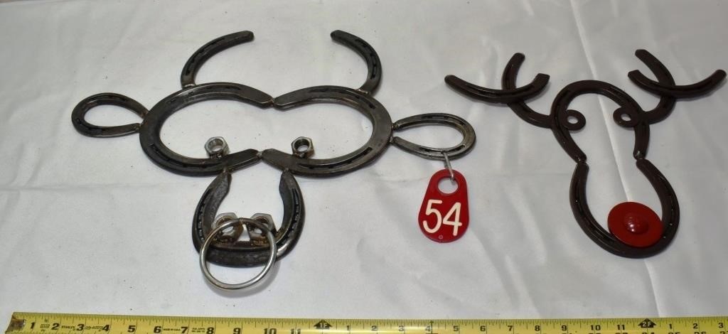 2 horseshoe sculptures: bull and Rudolph; as is
