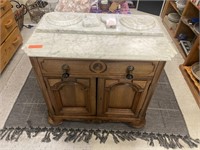 Wash stand with marble stone top.